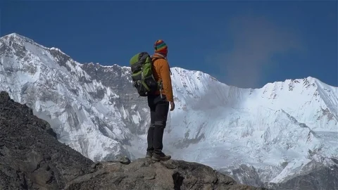 A man on top of a cliff Stock Footage 85277239
