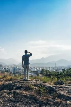 Man on a top of a hill Stock Photos