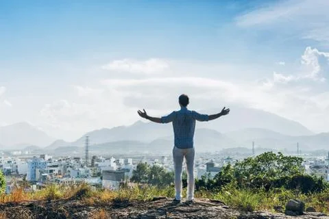 Man on a top of a hill Stock Photos