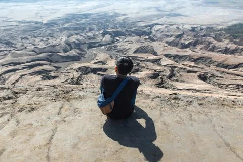 Man on top of Layer Volcanic ash as sand ground of Mount Bromo volcano (Gunun Stock-Fotos