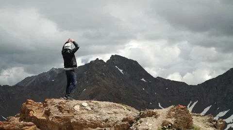 Man on top of mountain. Conceptual design Stock Footage 65483351