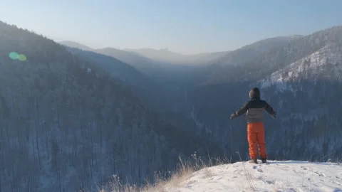 A man on top of a mountain. Stock Footage 102530314