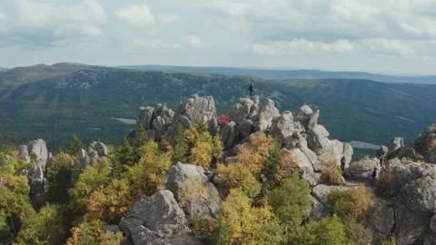 A man on top of a mountain Stock Footage 146941345