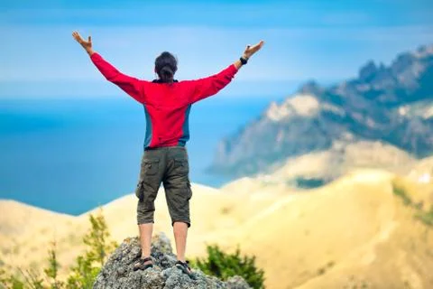 Man on top of mountain Stock Photos