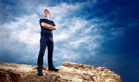 Man on the top of mountain. Stock Photos