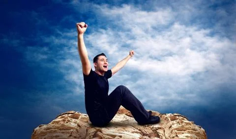 Man on the top of mountain. Stock Photos