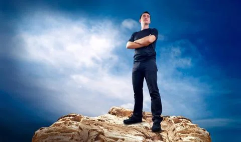 Man on the top of mountain. Stock Photos