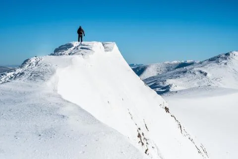 Man on top of mountain Stock Photos