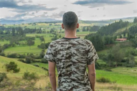 Man on top of a mountain Stock Photos