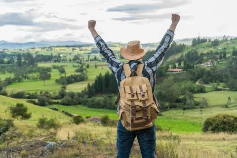 Man on top of a mountain Stock Photos