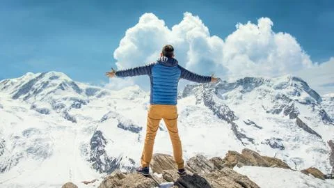 Man at the top of mountain Stock Photos