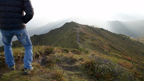 Man on top of the summit Stock Footage 95934179