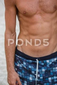 Man torso on the Beach Stock Photos