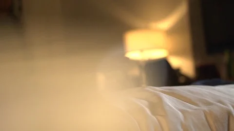 Man Tossing Backpack On Bed 動画素材 83525280