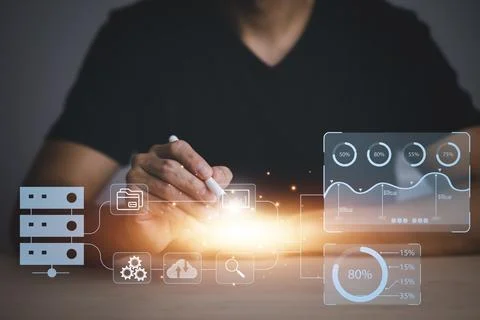 Man touch Analytics and Data Management System on computer,metrics connected  Stock Photos