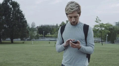 Man touch a smartphone Stock Footage 78733563