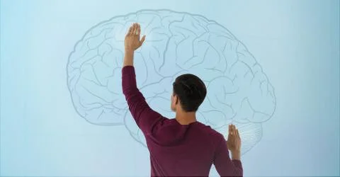 Man touches brain interface Stock Photos