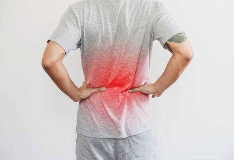 A man touching back, with red highlight concept of back pain, backache Stock Photos
