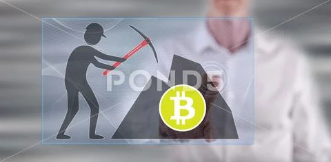 Man touching a bitcoin mining concept Stock Photos