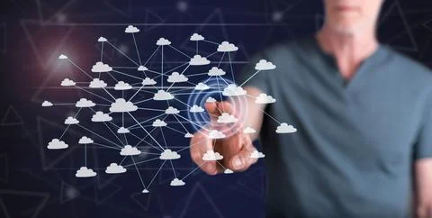 Man touching a cloud network concept 库存照片