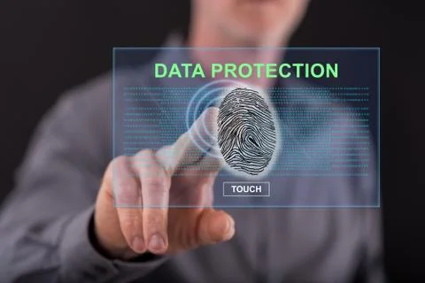 Man touching a data protection concept on a touch screen 스톡 사진