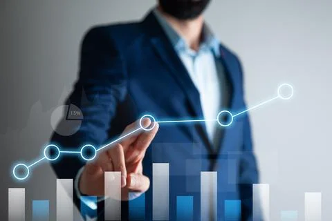 Man touching in graph Stock Photos