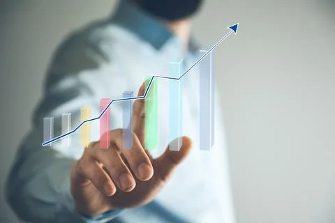 Man touching graph in screen Stock Photos
