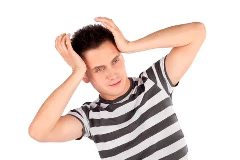 Man touching head pose Stock-Fotos