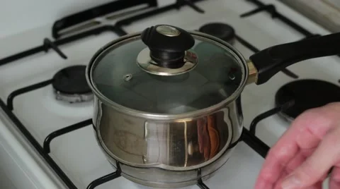 Man touching a hot pan Stock Footage 66754001