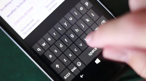 Man touching keys on a smartphone Vídeo Stock 65370794