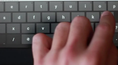 Man touching keys on a tablet Stock Footage 65370812