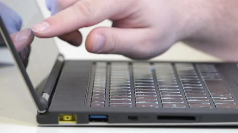Man touching the laptop screen. Close up Stock Footage 48989941