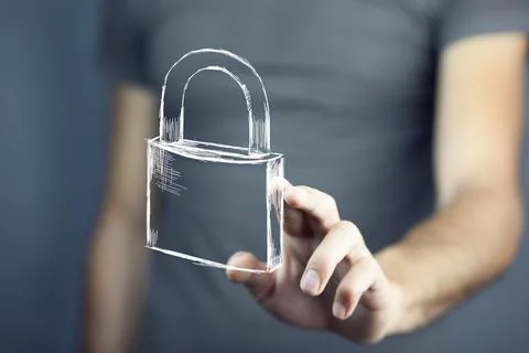 Man touching lock in screen Stock Photos