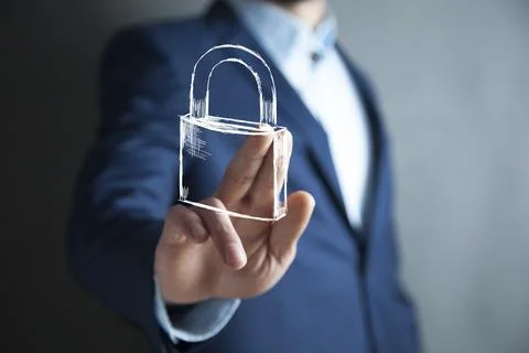 Man touching lock in screen Stock Photos