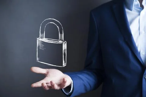 Man touching lock in screen Stock Photos
