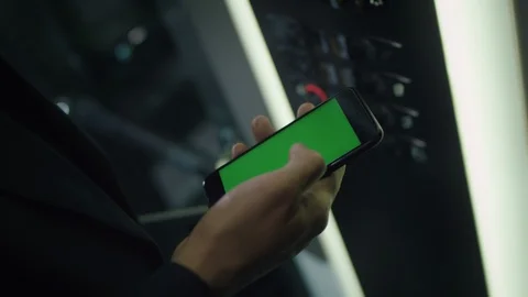 Man touching mobile smart phone with chroma key green screen Stock Footage 94147461