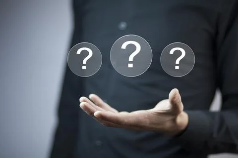 Man touching question mark in screen Stock Photos