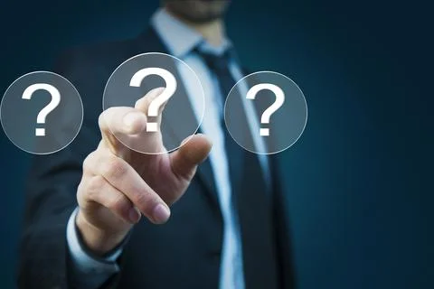 Man touching question mark in screen Stock Photos