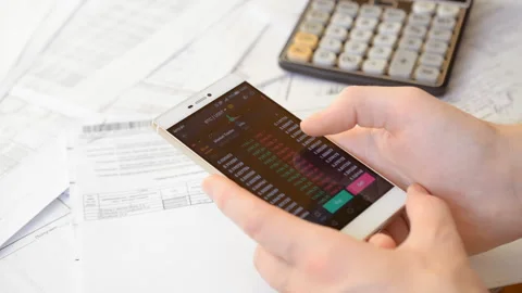 Man touching screen, browse foreign exchange market data, chart Stock Footage 120645054