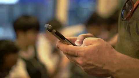 Man touching screen on smartphone while texting a message Video stock 88539146