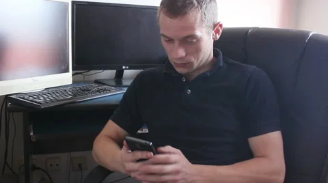 Man touching smartphone at office Video stock 55533231