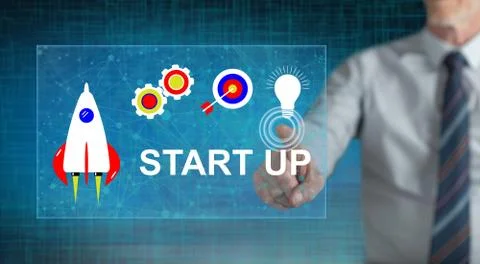 Man touching a start up concept Фото