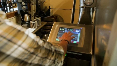 Man is touching the tablet of coffee machine 스톡 동영상 122590206