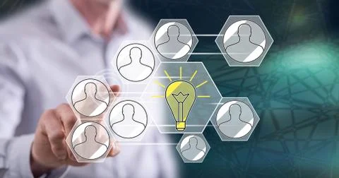 Man touching a teamwork idea concept Stock-Fotos