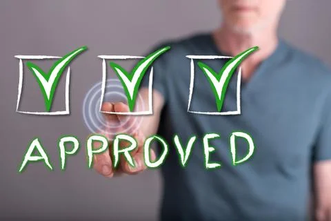 Man touching a validation concept on a touch screen Stock Photos