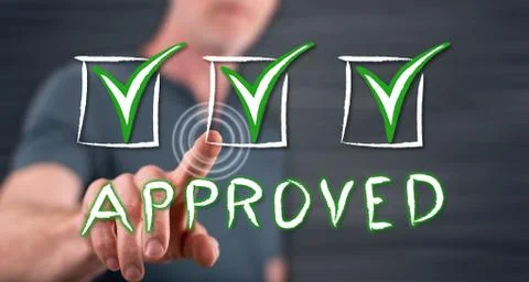 Man touching a validation concept on a touch screen Stock Photos