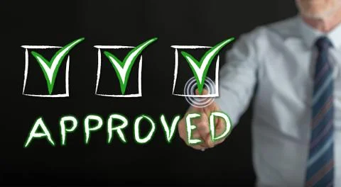 Man touching a validation concept on a touch screen Stock Photos
