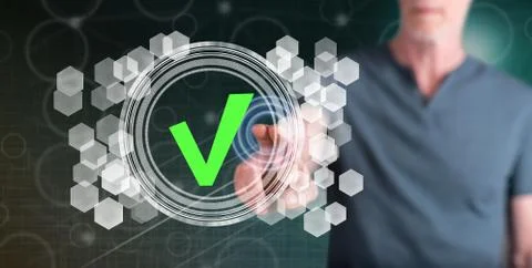 Man touching a validation process concept Stock Photos