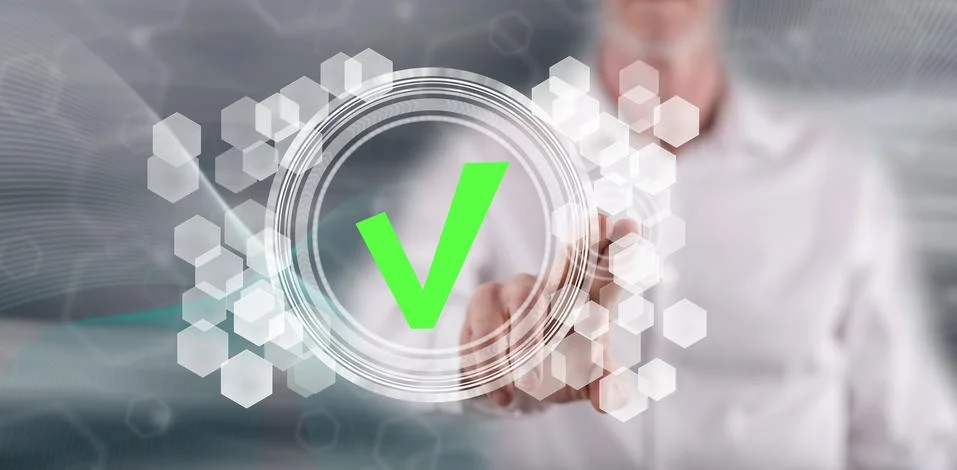 Man touching a validation process concept Stock Photos