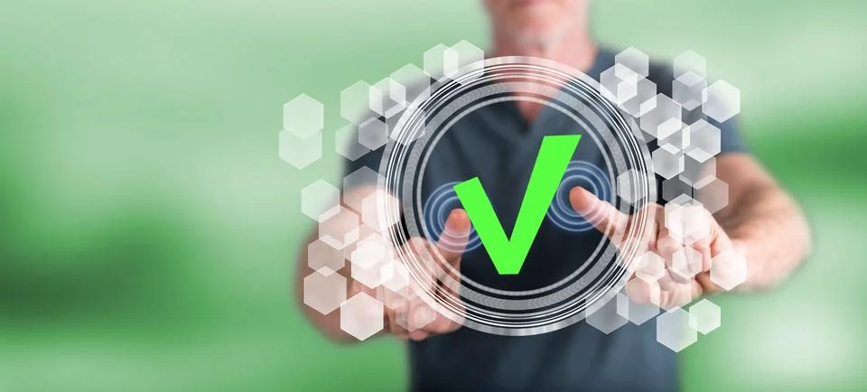 Man touching a validation process concept Stock Photos
